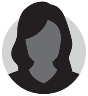  A headshot of a woman with a friendly expression, looking directly at the camera.